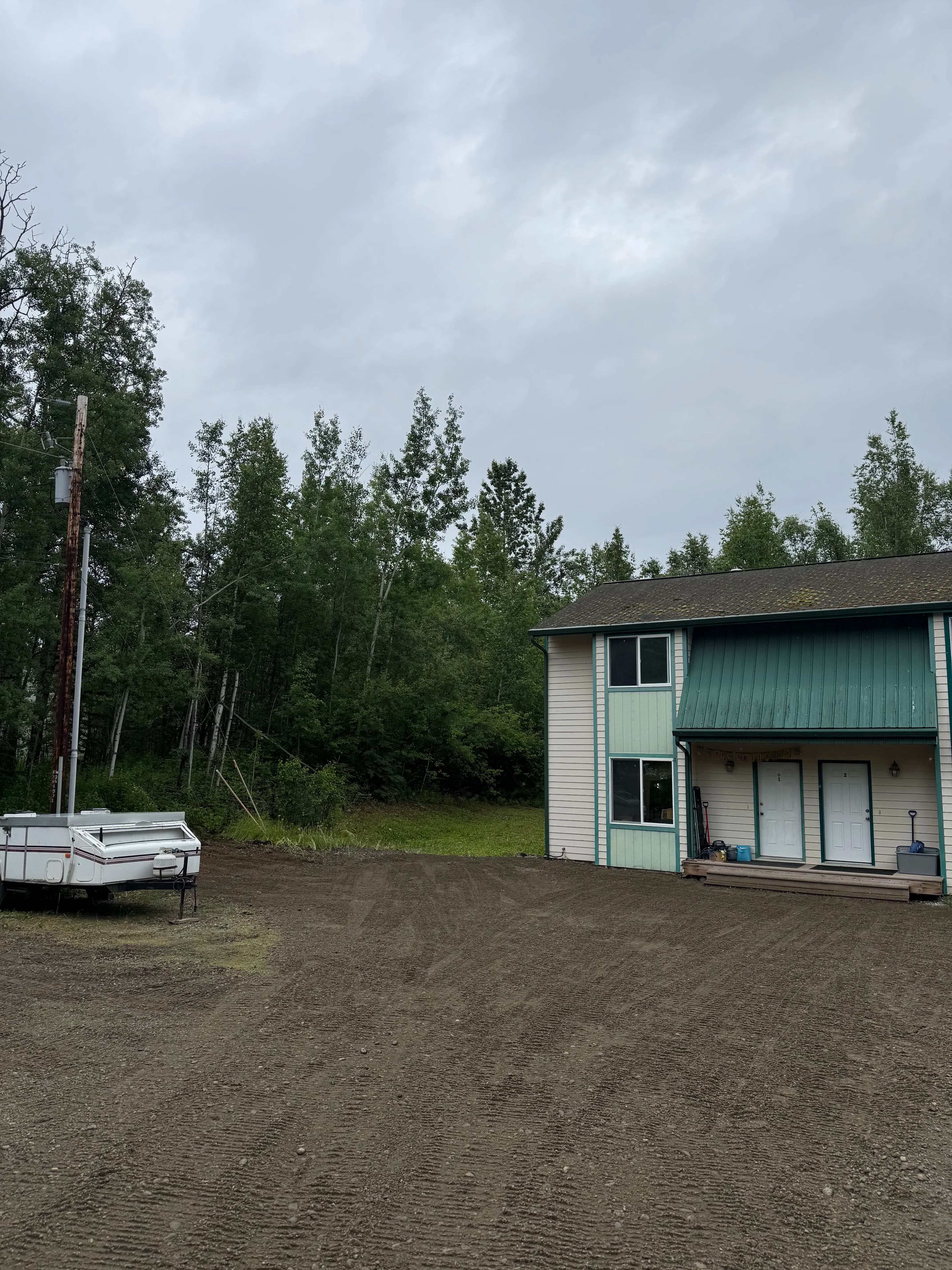 Project Driveway Grading and Drainage Fix at a Local 4-Plex image