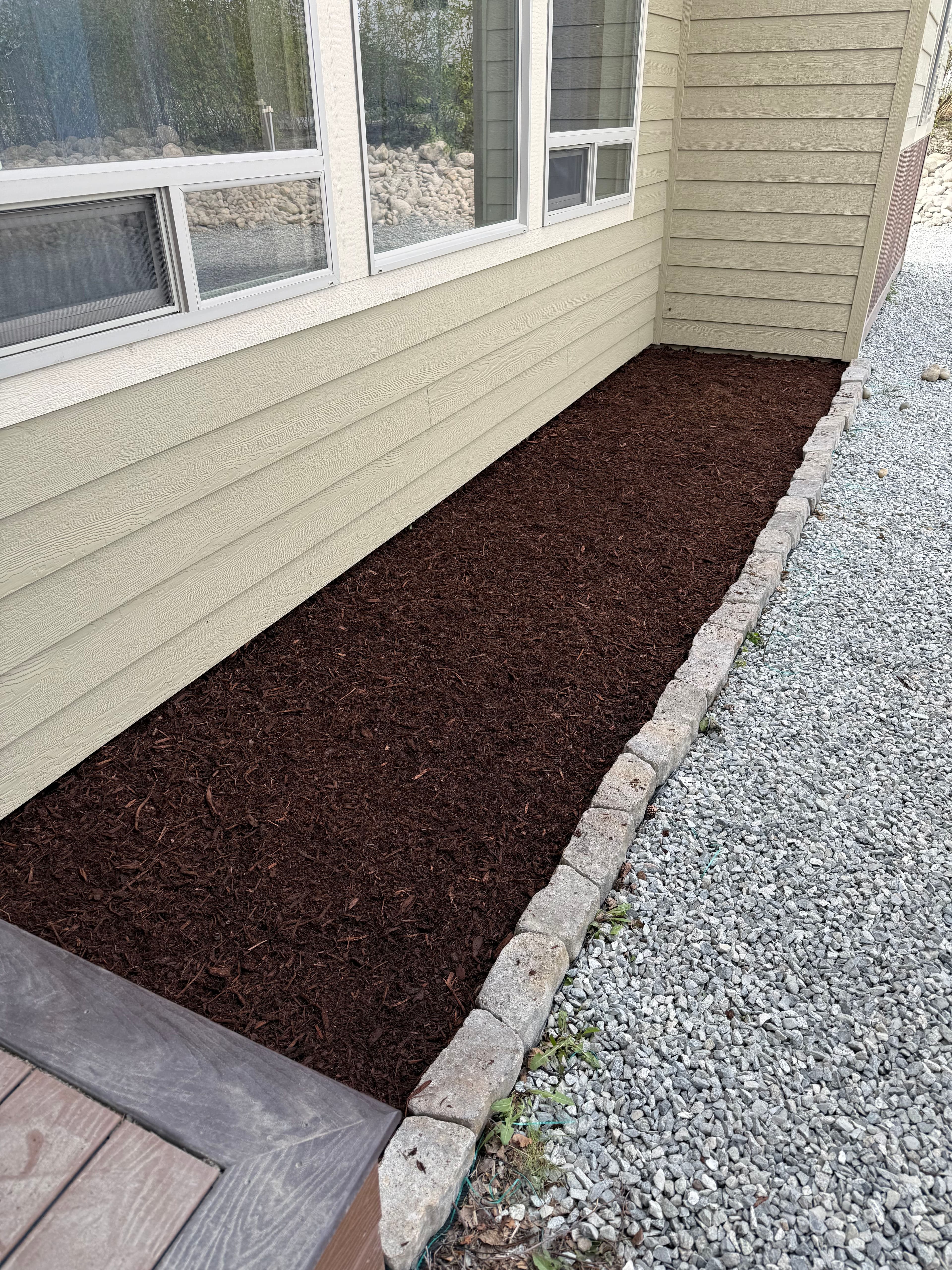 Project Fresh Mulch and Weed Barrier for a Low-Maintenance Flower Bed image